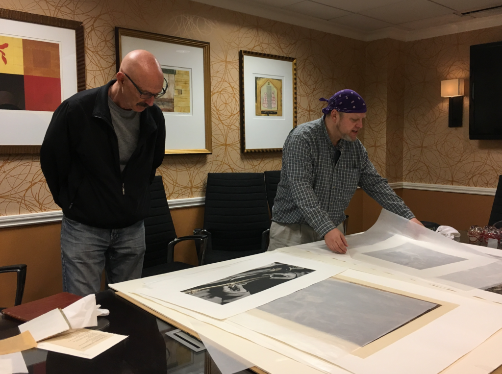 Tony Levin and Jon Lybrook reviewing prints by Intaglio Editions in 2019